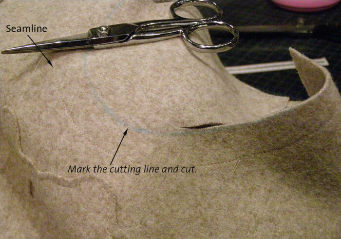 Sew the front sleeve seam, and steam the sleeves on the sleeve stretchers