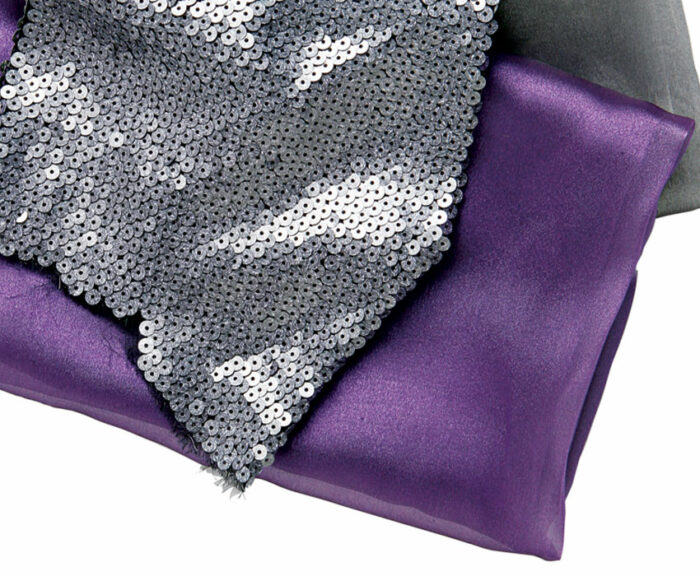 Add a little sparkle (or a lot) with sequined fabric, iridescent gazar, or metallic organza