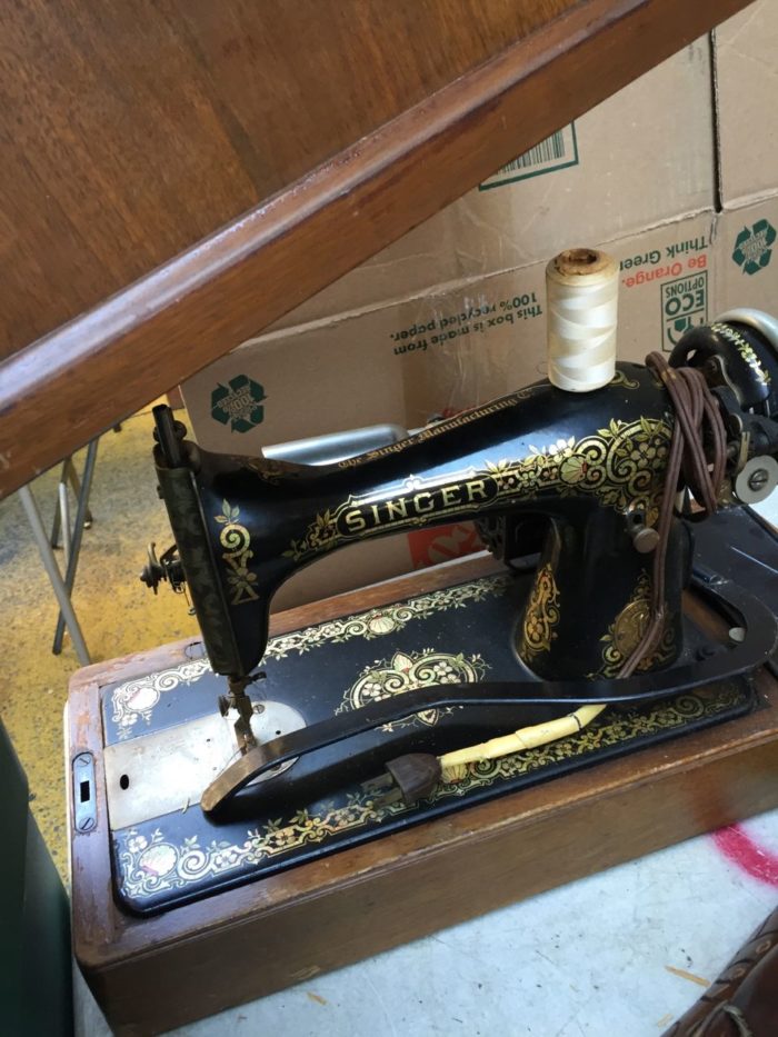 Industrial desk made from antique Singer sewing machine treadle bases.