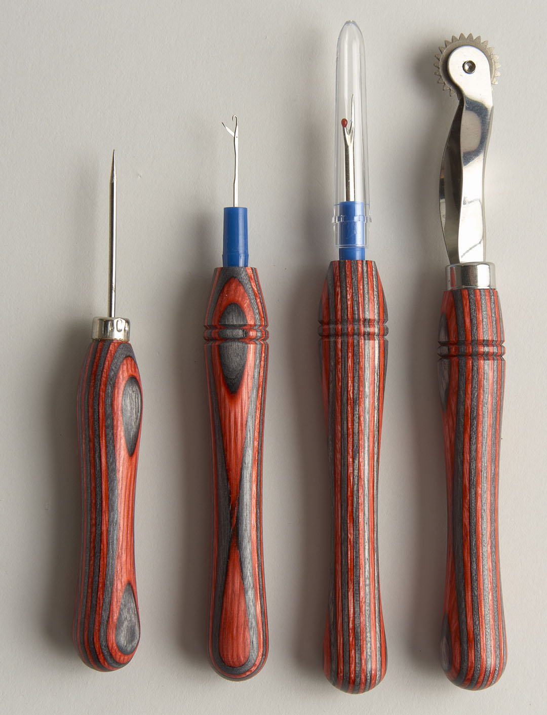 Hand-turned wooden sewing tools