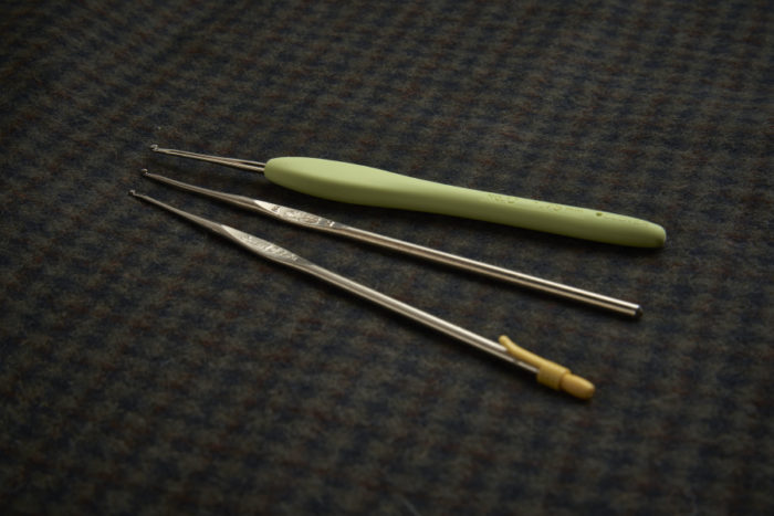 Steel crochet hooks in small sizes, with pointed hooks, are essential for this process. Look for sizes from 1.15 mm to 1.75 mm.