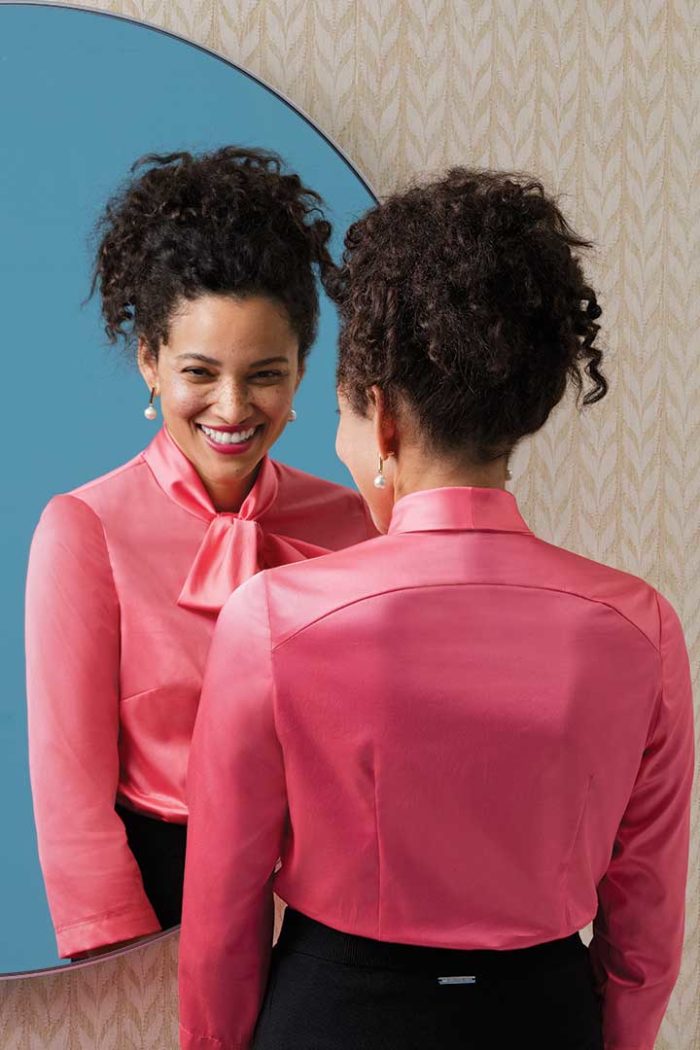 Women in a beautiful pink shirt