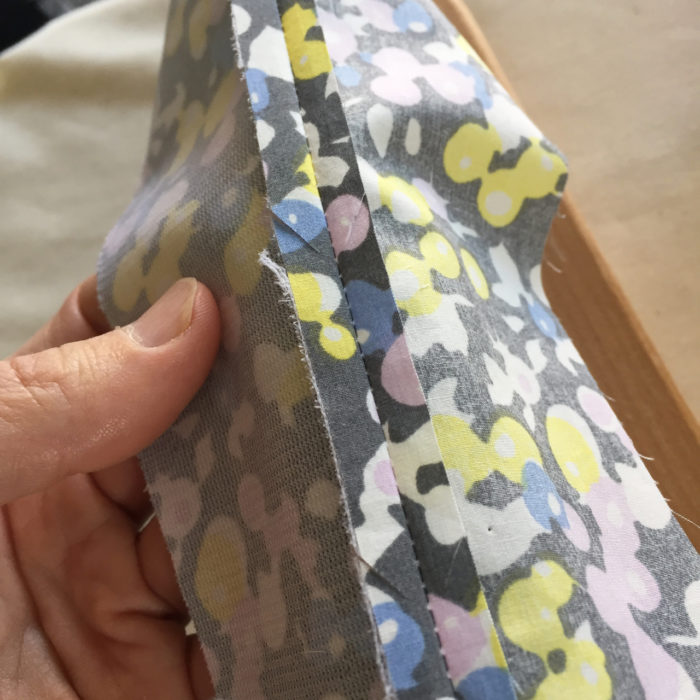 clipping into a seam allowance on an angle for more control.