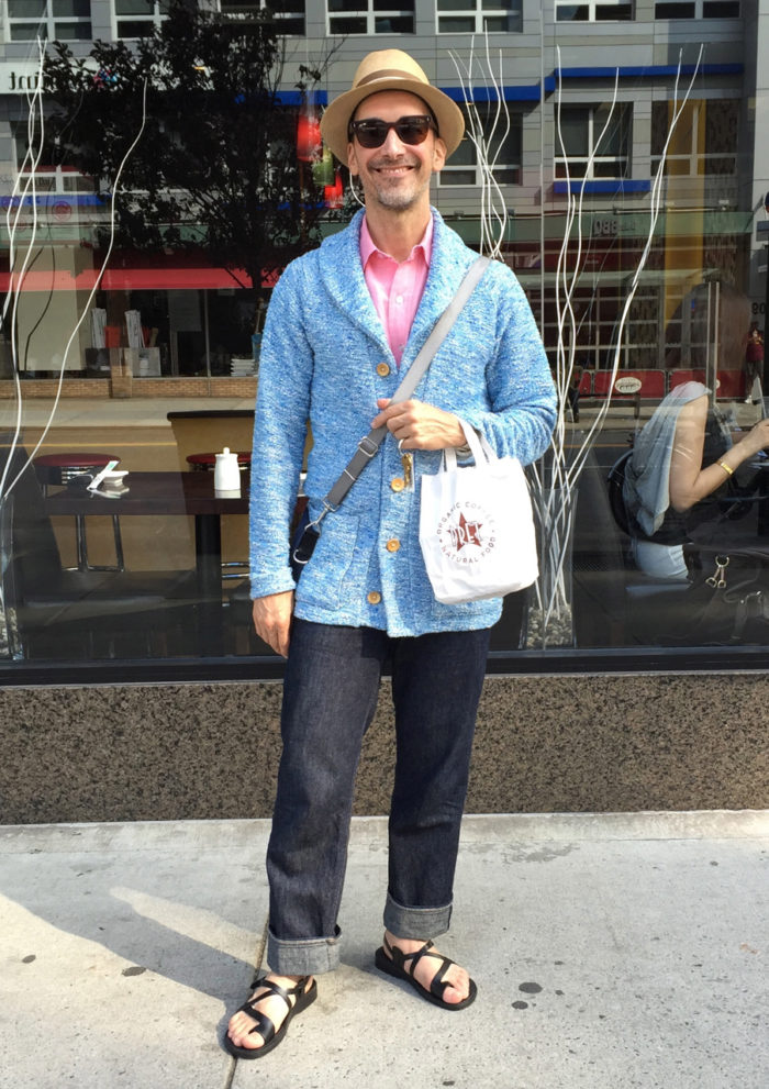 Peter Lappin wearing a blue shawl collar sweater from his home-sewn wardrobe 