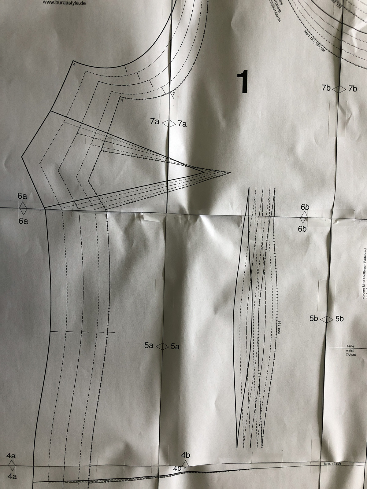 Tiled Burda pattern with bust and fish-eye darts