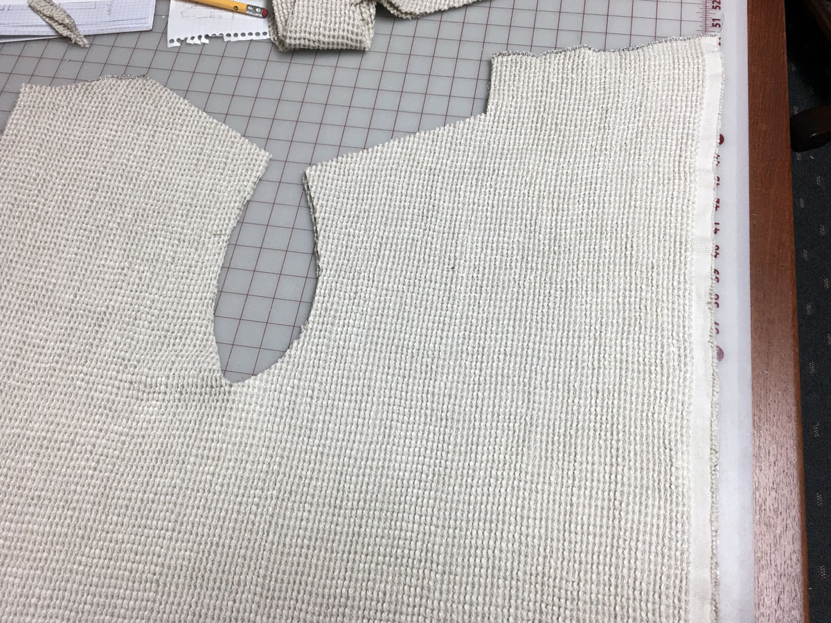 Sewing self-care: Waffle weave linen yardage is cut into front and back sections for a bathrobe