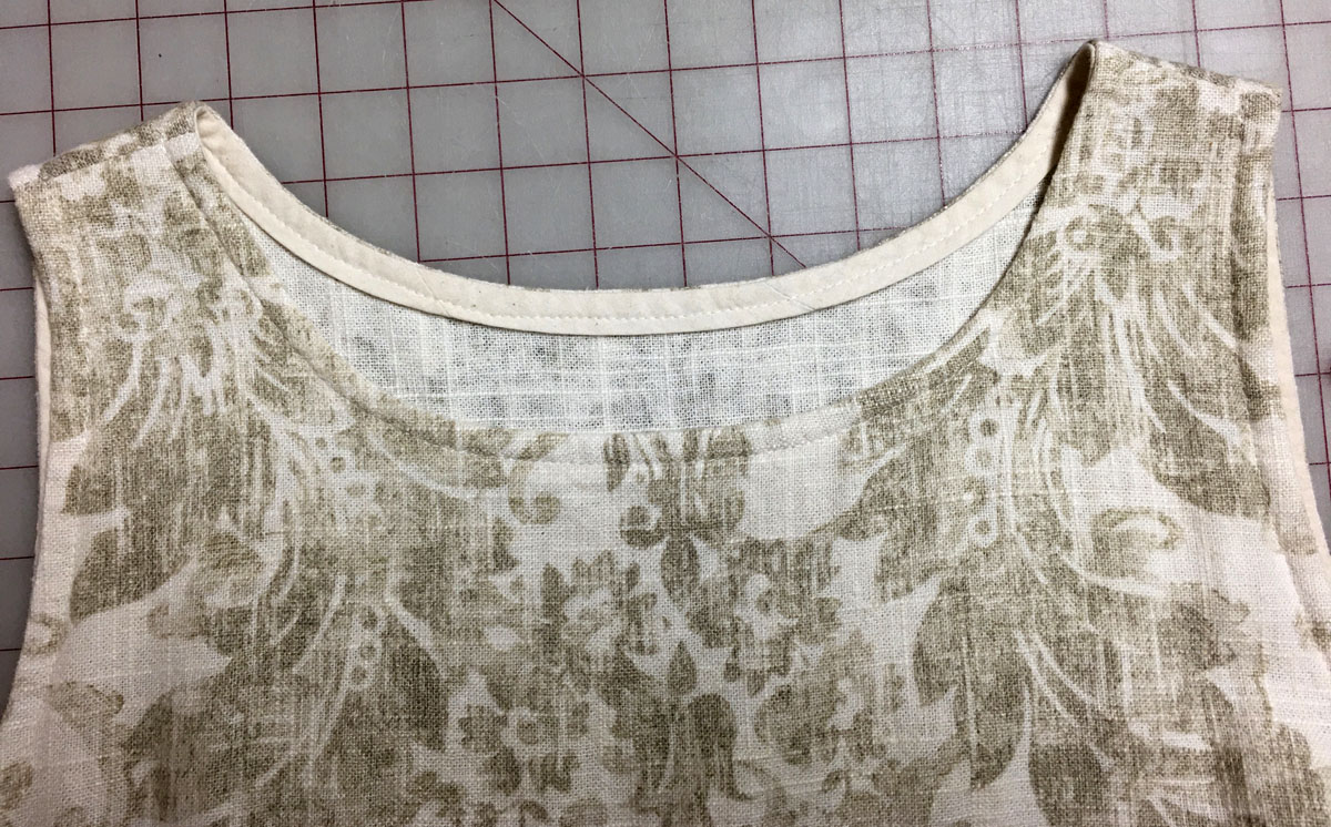 Floral top with narrow bias facing