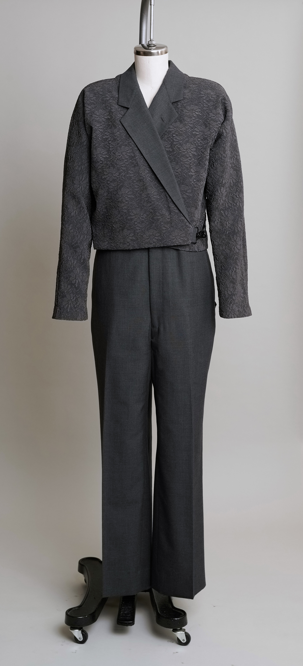 Women's dark pantsuit on dress form