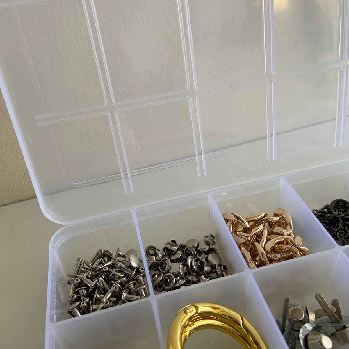 Organization tips: clear plastic storage for small supplies