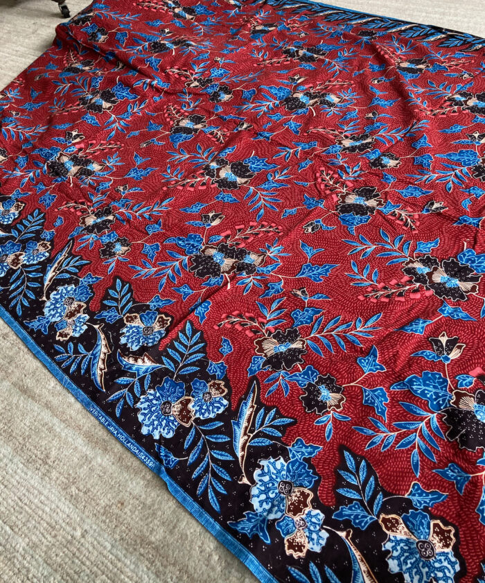 Blue and maroon floral border print.