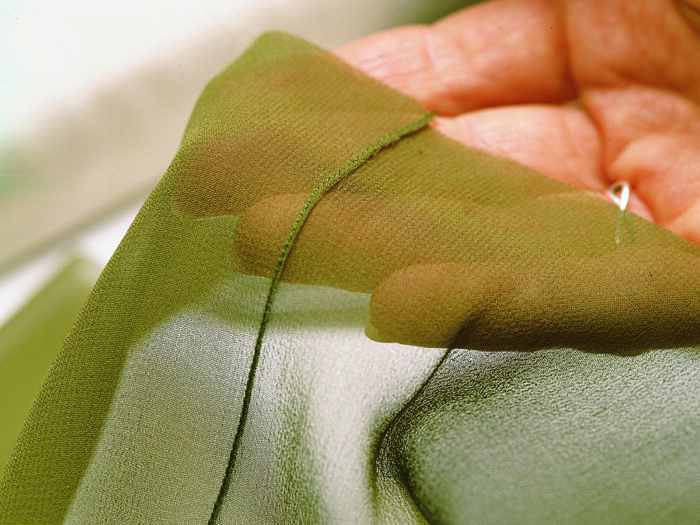 close-up of narrow French seam sewn on silk chiffon