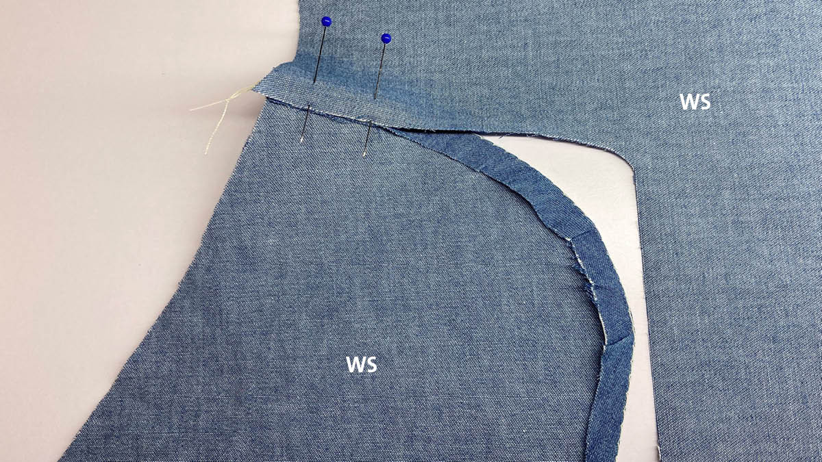 Lapped and appliqued seam: align and pin seam allowances of two garment sections