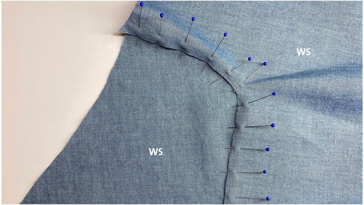 Lapped and appliqued seam: Use multiple pins to keep the curved garment edges aligned