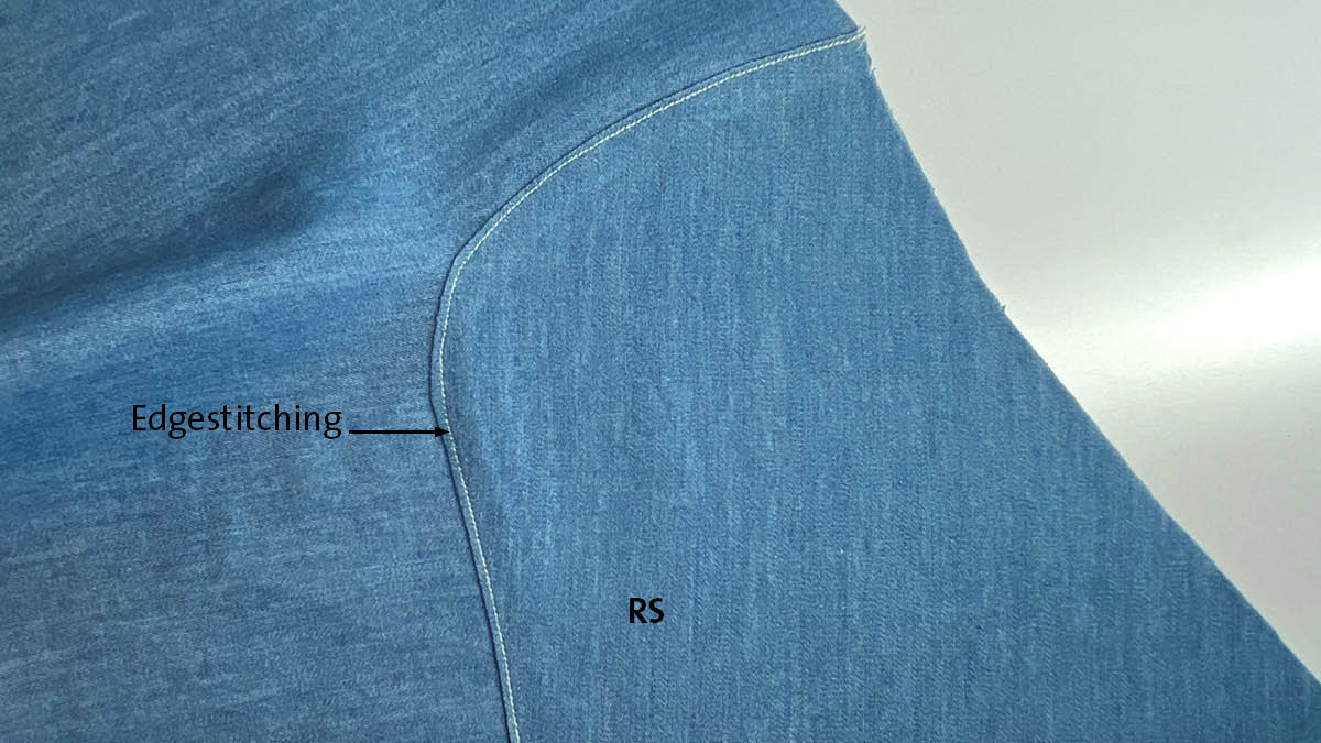 Lapped and appliqued seam: basting stitches removed and edgestitching remains