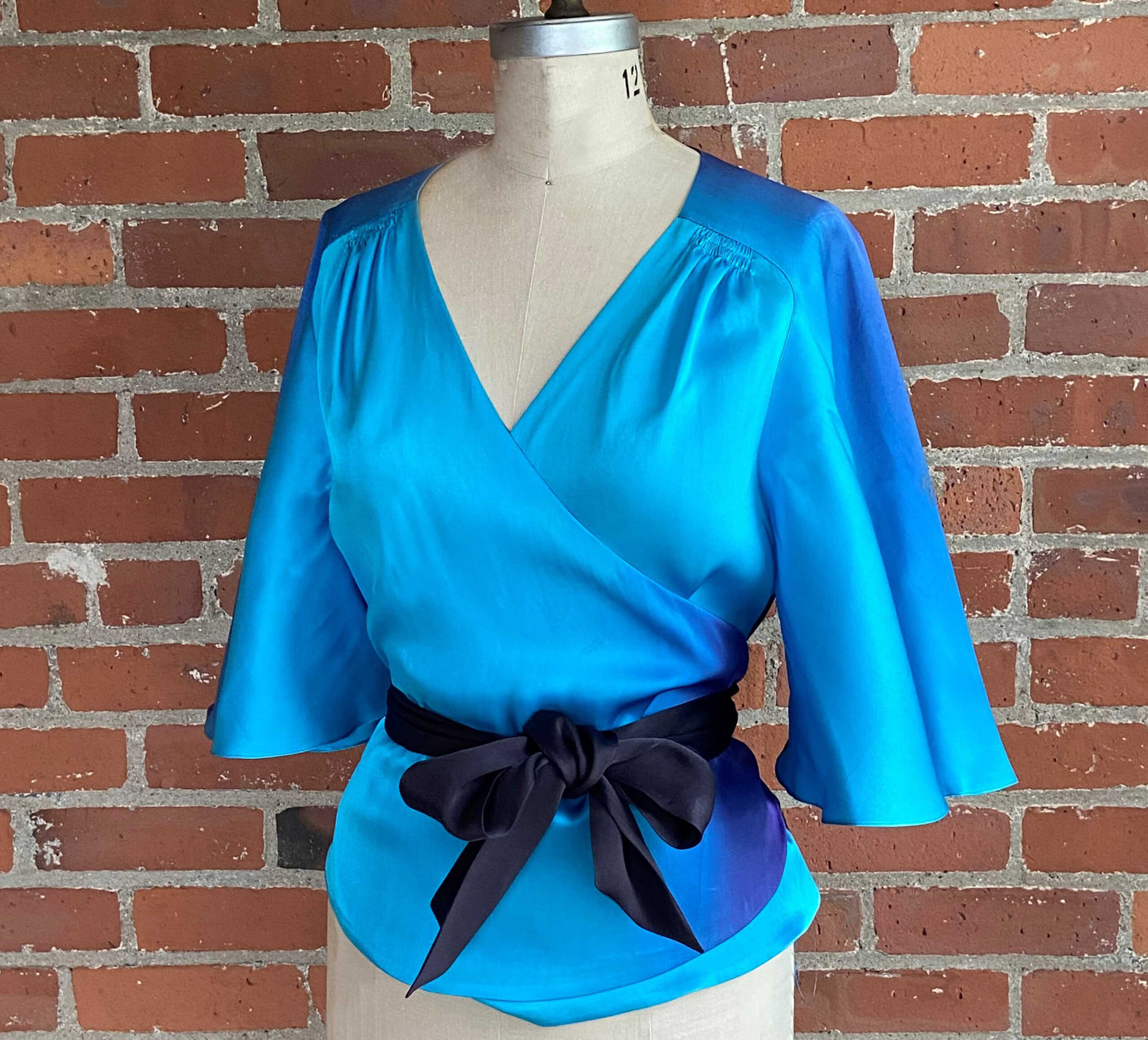 Decades of Style #3005 Butterfly Blouse with yoke seam, belted and on a dress form