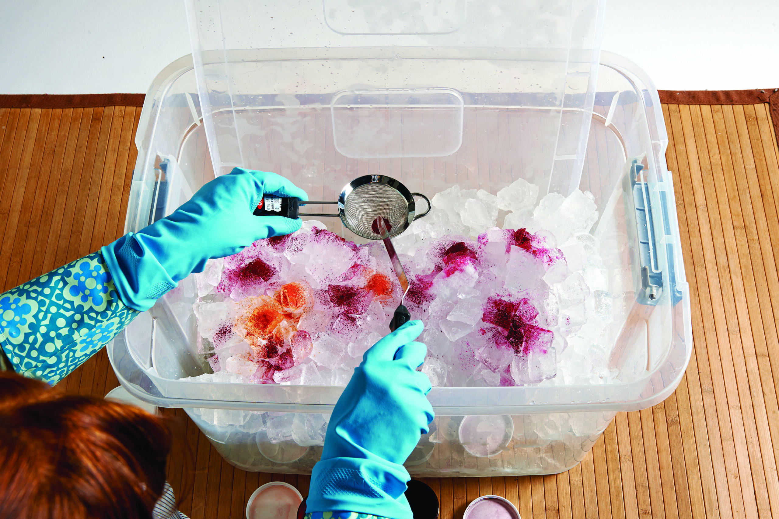 Fabric dye being applied to ice covered fabric.