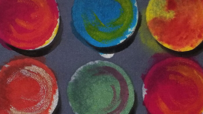 close-up of multi-colored fabric with a circle print: Gilbert Muniz's inspiration and creation 