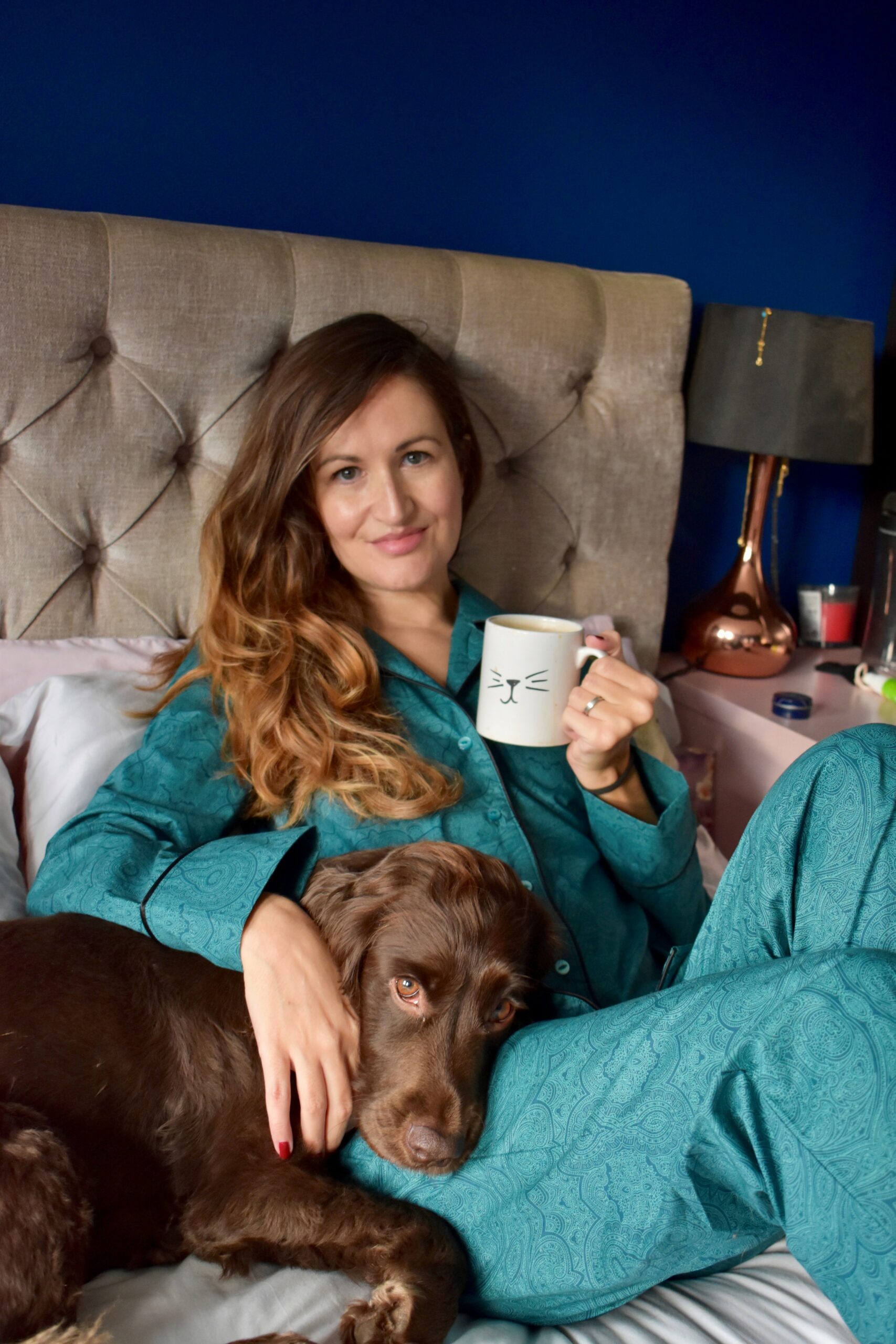 Woman relaxing on a bed in loungewear pajamas