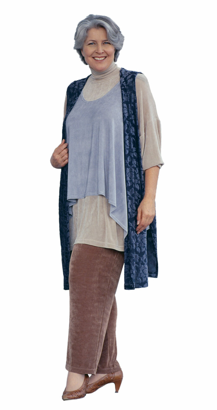 woman in a slinky knit vest and tunic