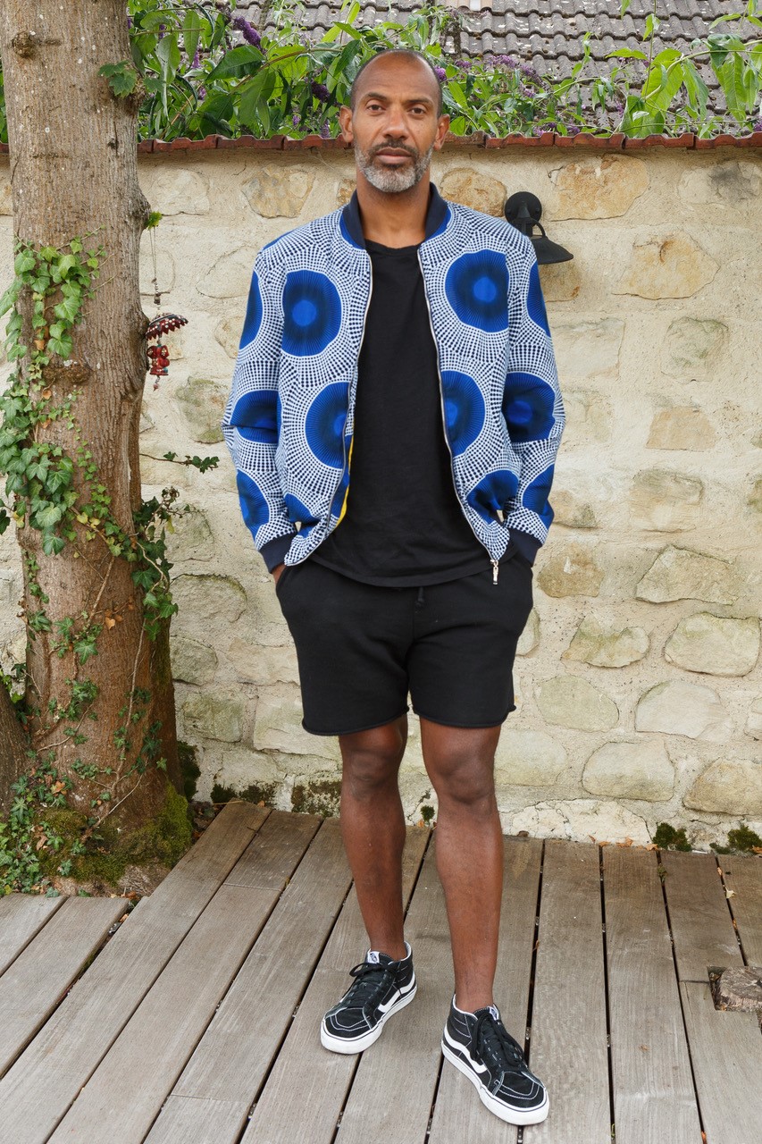 Michel Howard-Maurice, @1homme_derriere_lamachine, in wax print bomber jacket