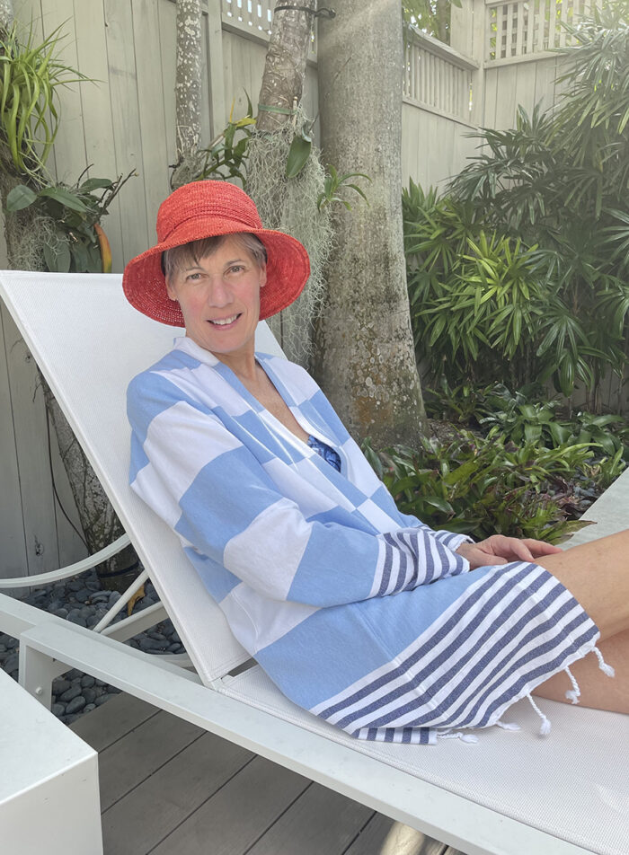 Becky Fulgoni lounging in her beach cover-up, a riff on a trusted pattern