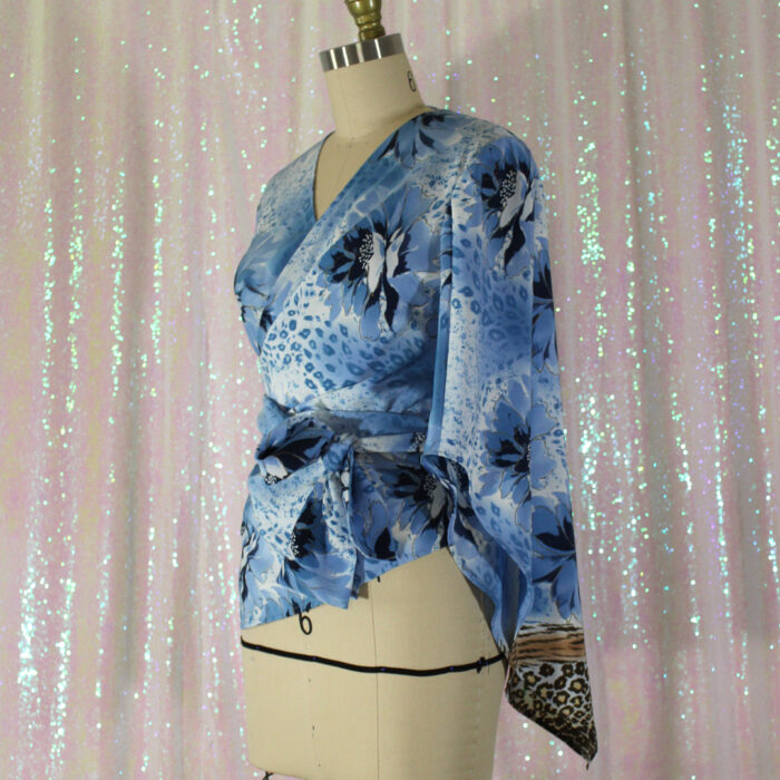 blue print wrap top with bell sleeve is an example of added fullness in the sleeve