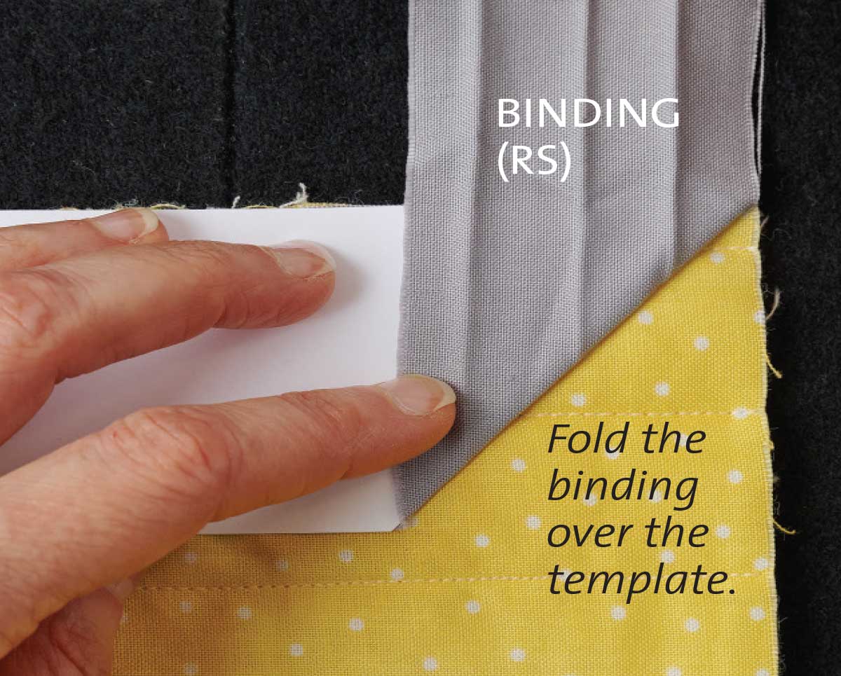 Fold the binding up. 