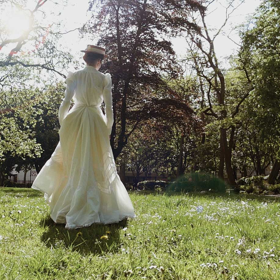 woman in white dress in field