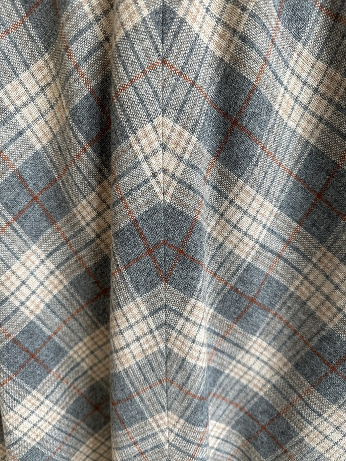 Closeup of matching seams of wool plaid skirt