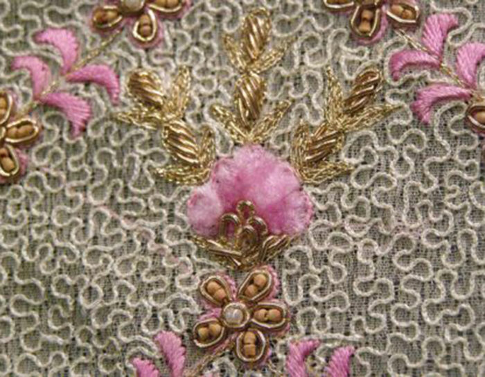 a close-up of the same--with more bullion work, chenille, and tambour with gold thread