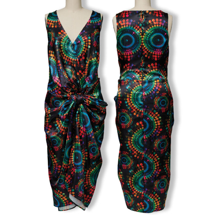 Multicolored dress on a dress form, front and back