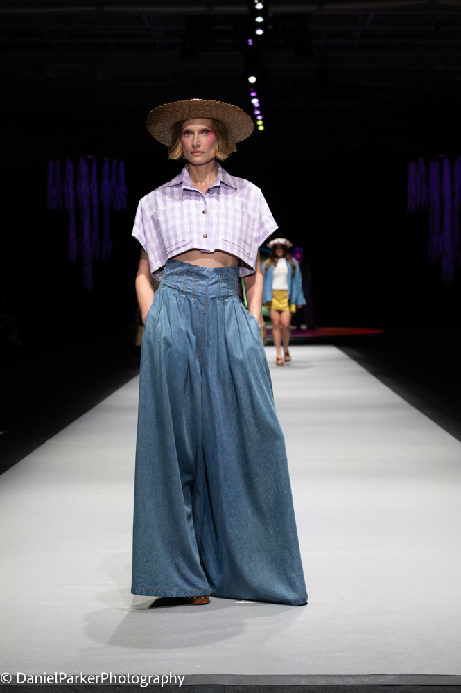 Janessa Cajudoy's wide-leg trousers and cropped top on the runway