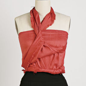 Tie into an asymmetrical halter